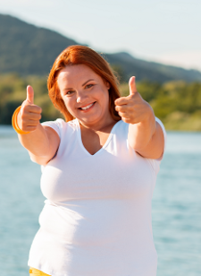 Woman with thumbs up